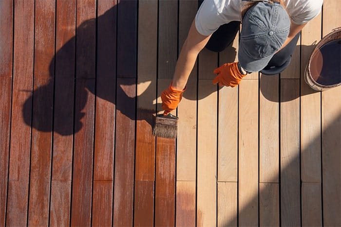 deck sealing services - brush and beyond company